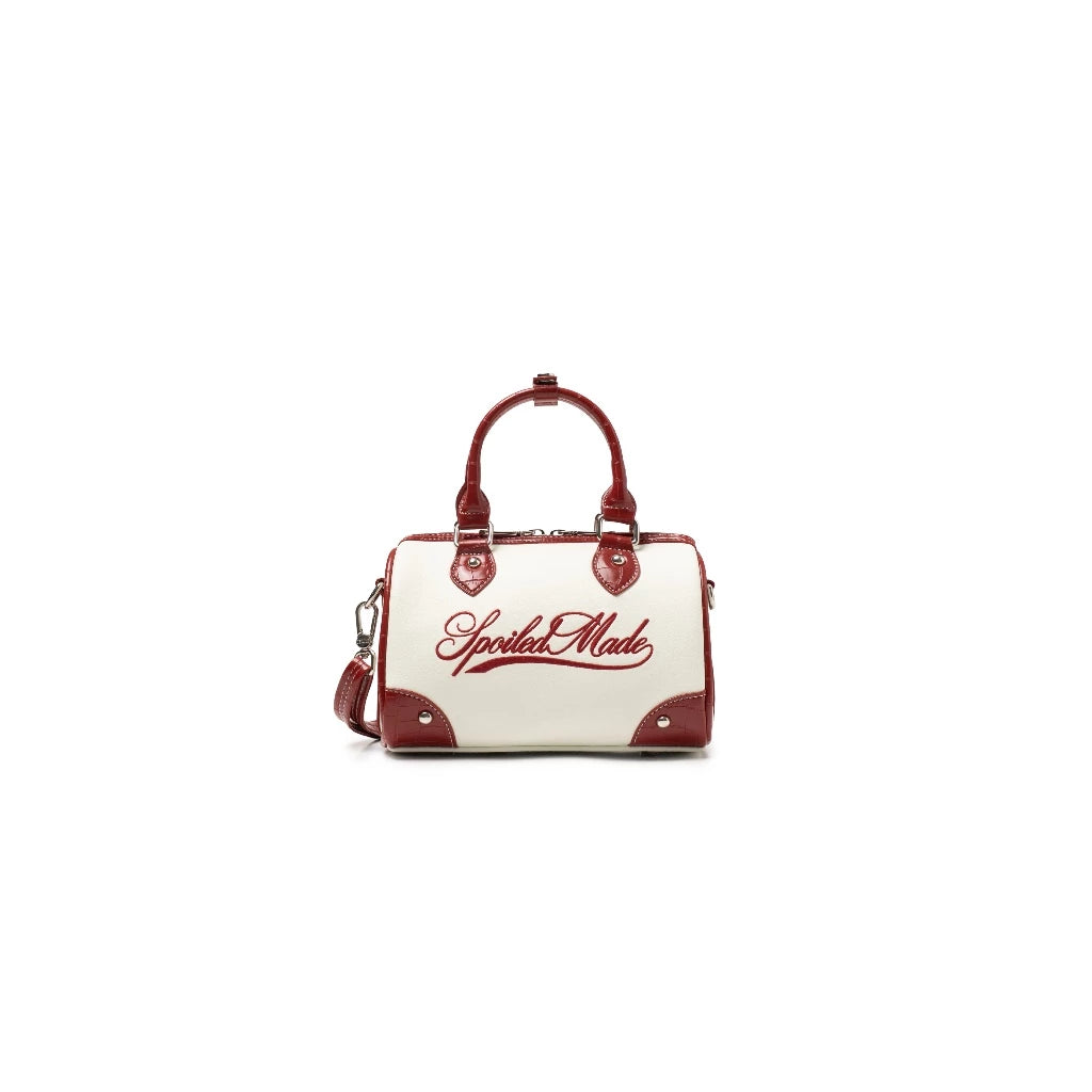 SPOILED MINI SPORTY STAIN-RESISTANT CROSSBODY BAG
